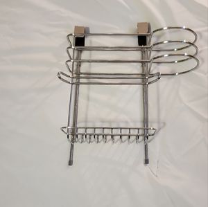 Over the cabinet door hair dryer organizer